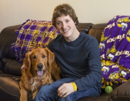Reese with his golden retriever Goldy